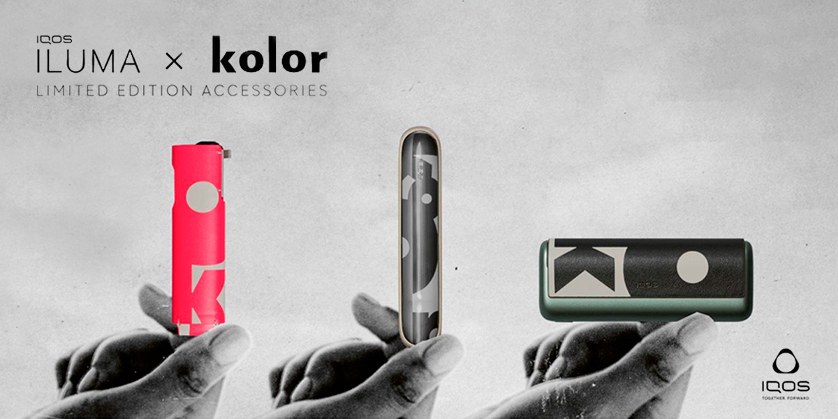 Vaper che tiene in mano tre dispositivi IQOS ILUMA con le varie versioni degli accessori Kolor in edizione limitata
