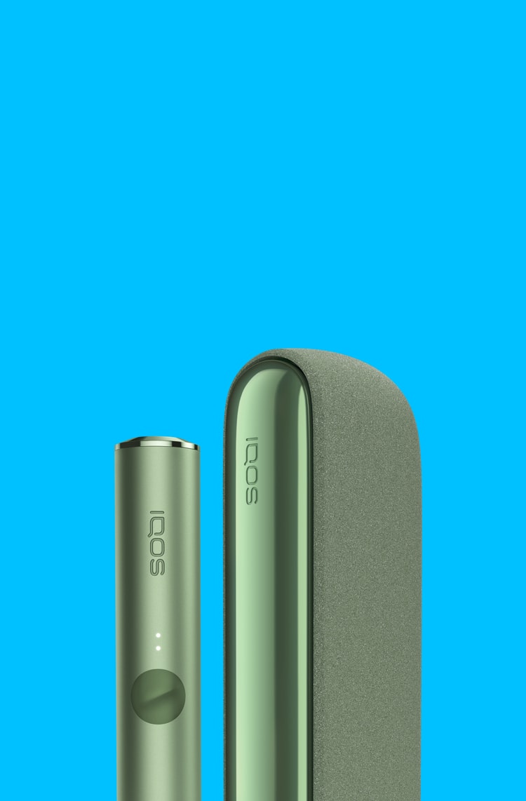 A Moss Green IQOS ILUMA device and Pocket Charger.