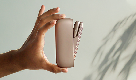 Man Holding IQOS 3 White